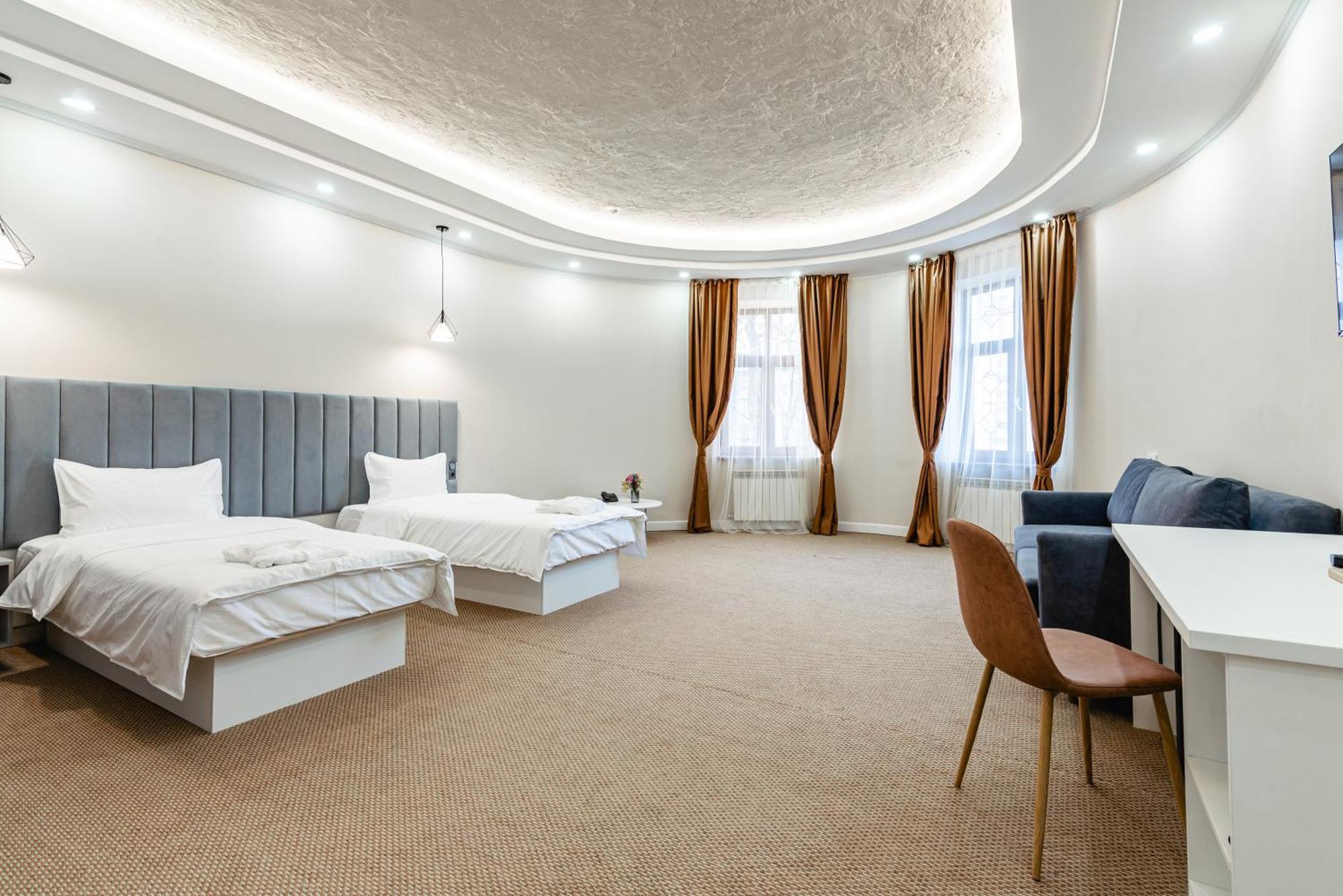 Aykun Hotel Almaty Esterno foto